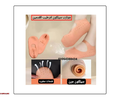 زوج من جوارب السيليكون تستخدم لاكساب القدمين نعومه والتخلص من التشققات - 1
